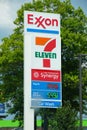 Nashville, Tennessee, U.S - June 26, 2022 - The colorful sign of Exxon gas station combined with 7 Eleven