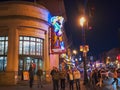 NASHVILLE, USA -April, 6, 2017: walking across street towards a neon sign in nashville, tn