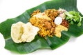 Nasi briyani with lamb mutton served on banana leaf plate