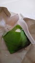 Nasi Lemak wrapped in banana leaf