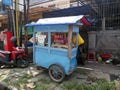 Nasi Uduk being sold on the roadside from a Gerobak Street Food Cart Royalty Free Stock Photo