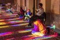 Nasir-ol-molk Mosque is full of colorful light in the morning. Tourists look at the interior. All is painted in colorful colors f Royalty Free Stock Photo