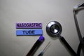 Nasogastric Tube text on Sticky Notes. Top view isolated on office desk. Healthcare/Medical concept