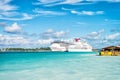 Nassau, Bahamas - January 07, 2016: cruise ships in port. Ocean liners in Caribbean sea on sunny blue sky. Summer vacation on trop Royalty Free Stock Photo