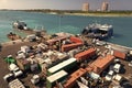 Nassau, Bahamas - March 09, 2016: cargo ship and dump containers of scrap metal at harbor