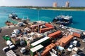 Nassau, Bahamas - March 09, 2016: cargo ship and dump containers of scrap metal at harbor