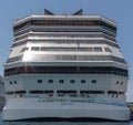 Nassau, Bahamas - May 14, 2019: Carnival Sunrise cruise ship docked at Prince George Wharf. Blue mooring lines leading to the pier