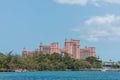 Nassau, Bahamas - May 14, 2019: Distant shot of Atlantis resort and hotel on Atlantis Paradise Island. Turquoise water and trees Royalty Free Stock Photo