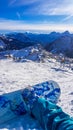 Nassfeld - A snowboarder taking a break on the slope