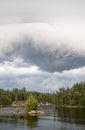 A nasty cloud to spoil a summer day Royalty Free Stock Photo