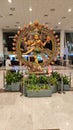 Natarajan wooden painted statue at Chennai international airport