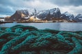 Natical rope at a pier on the background of mountains and landscapes on the islands Lofoten. Place for text or advertising Royalty Free Stock Photo