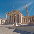 The national academy of Athens neo classical building facade under blue sky with sun rays, Greece Royalty Free Stock Photo