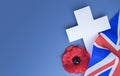 national British holiday Memorial Day concept with cross, uk flag and poppy