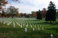 the national cemetery has many rows of white and gray headstones