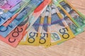 National currency. Colorful australian dollar banknotes on wooden table close up Royalty Free Stock Photo