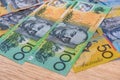 National currency. Colorful australian dollar banknotes on wooden table close up Royalty Free Stock Photo