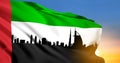 National day of United Arab Emirates. Silhouette of Dubai skyline with UAE flag on background of sunset Royalty Free Stock Photo