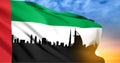 National day of United Arab Emirates. Silhouette of Dubai skyline with UAE flag on background of sunset Royalty Free Stock Photo