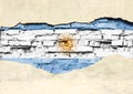National flag of Argentina on a brick background. Brick wall with partially destroyed plaster, background or texture Royalty Free Stock Photo