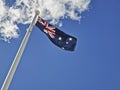 National Flag Of Australia Consists Of Union Jack And Southern Cross Stars Constellation In Blue Sky Sunny Day With White Cloud