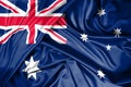 National flag of Australia hoisted outdoors with sky in background. Australia Day Celebration Royalty Free Stock Photo