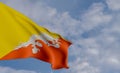 National flag Bhutan, Bhutan flag, fabric flag Bhutan, blue sky background with Bhutan flag, 3D work and 3D image Royalty Free Stock Photo