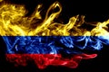 National flag of Colombia made from colored smoke isolated on black background. Abstract silky wave background. Royalty Free Stock Photo