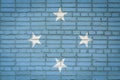 Flag banner on brick wall background