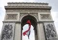 The national flag of France in the arch of the Arc de Triomphe in Paris