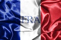 National Flag Of France Waving in the Wind With Country Name On Royalty Free Stock Photo