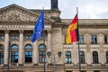 Flags of Germany and European Union against Bundestag building Royalty Free Stock Photo