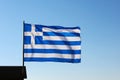 The national flag of Greece against the sky. Greece Independence Day. Waving Greek twocolor. Popularly referred to as Royalty Free Stock Photo