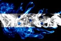 National flag of Honduras made from colored smoke isolated on black background. Abstract silky wave background. Royalty Free Stock Photo