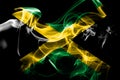 National flag of Jamaica made from colored smoke isolated on black background