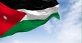 National flag of Jordan waving in the wind on a clear day
