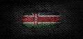 National flag of the Kenya on dark fabric