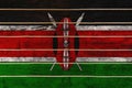 National flag of Kenya on a wooden wall background. Royalty Free Stock Photo