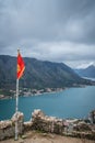 Montenegrin flag on the ruins of the St John fortress