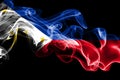 National flag of Philippines made from colored smoke isolated on black background. Abstract silky wave background Royalty Free Stock Photo