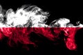 National flag of Poland made from colored smoke isolated on black background. Abstract silky wave background.