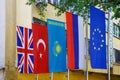 The national flag of the Republic of Kazakhstan is next to the national flags of the United Kingdom, Turkey, Russia