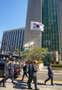 The national flag of the Republic of Korea. Office high-rise buildings. Office workers go to work Royalty Free Stock Photo