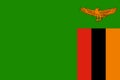 National Flag Republic of Zambia - vector, rgreen field with an orange coloured eagle in flight over a rectangular block of three Royalty Free Stock Photo