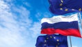 The national flag of Russia waving between two European Union flags Royalty Free Stock Photo