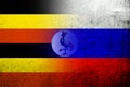 National flag of Russian Federation with The Republic of Uganda National flag. Grunge background