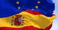 National flag of Spain waving with the European Union flag in the background on a clear day Royalty Free Stock Photo