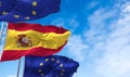 The national flag of Spain waving between two European Union flags Royalty Free Stock Photo