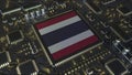 National flag of Thailand on the operating chipset. Thai information technology or hardware development related