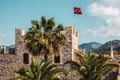 National flag of Turkey on the castle wall in Marmaris. Royalty Free Stock Photo